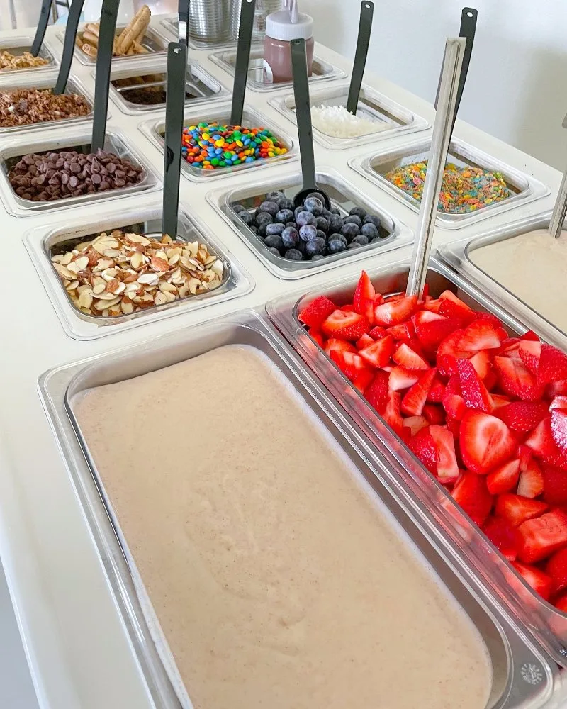 Fresh strawberries and dessert toppings bar from Delicias Factory catering