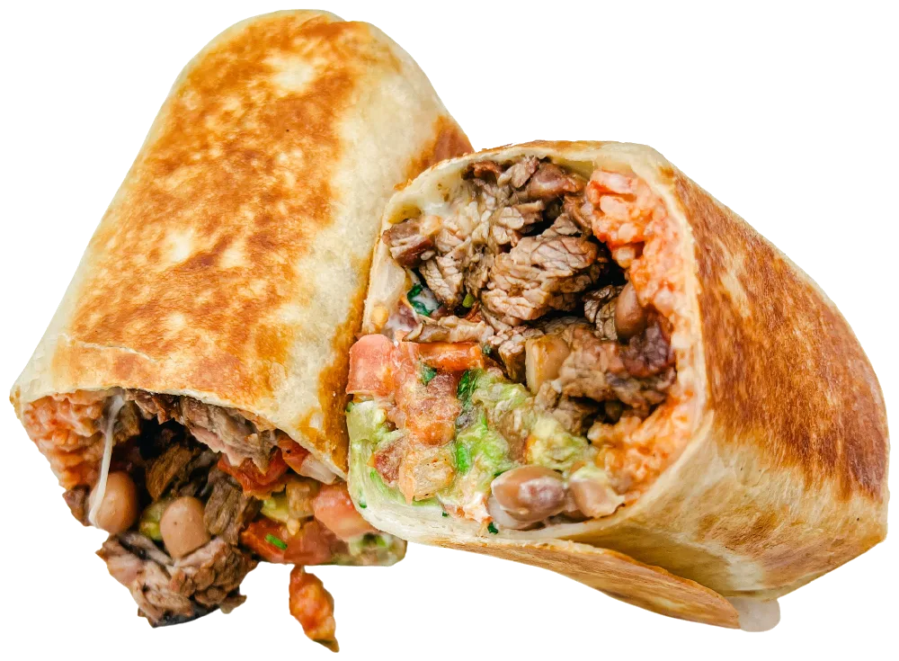 Steak burrito cut in half with carne asada, rice, beans, pico de gallo and guacamole